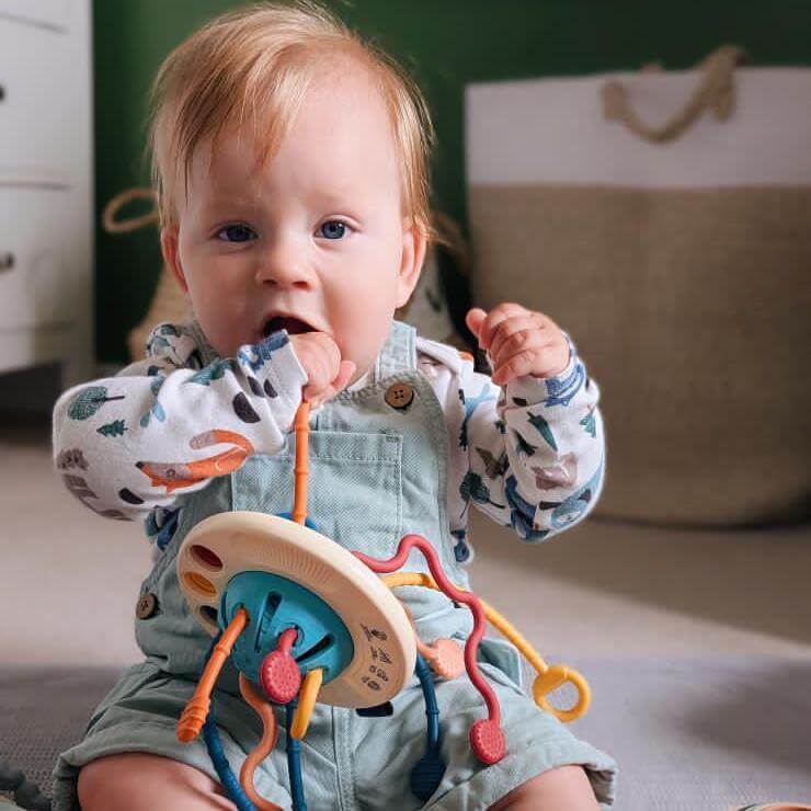 UFO Silicone Pulling Toy for Toddlers – Safe, Durable, Interactive Travel Companion with Pop-It Bubbles and Stretchable Cords 1